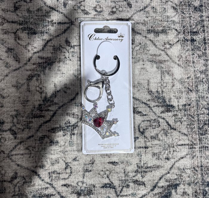 Silver crown keychain with red gem